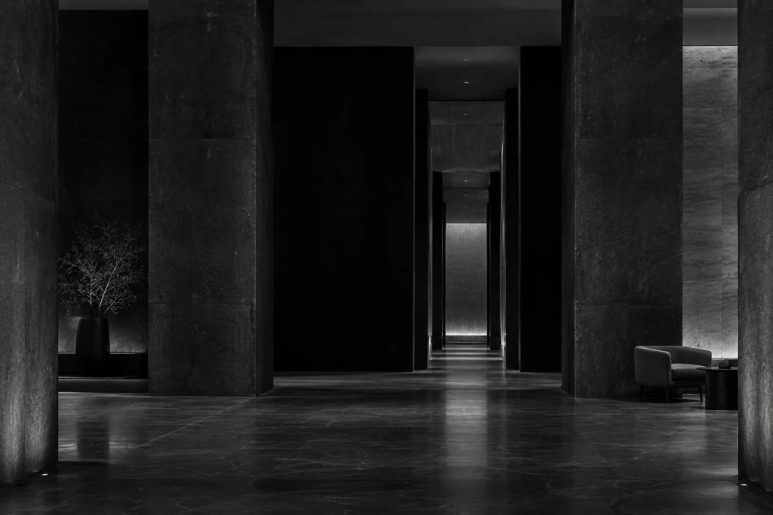 Dark architectural interior with a quiet corridor.